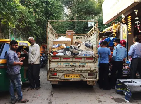 Mansi Thapliyal Govind's white van in which he collects all the scrap.