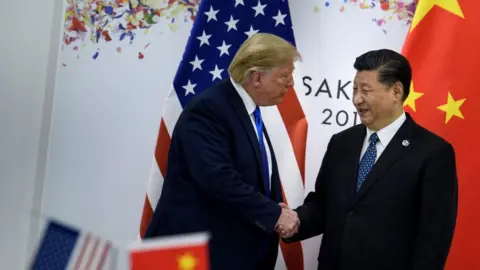Getty Images The US President Donald Trump meeting China's President Xi Jinping at the G20 meeting in Japan in 2019