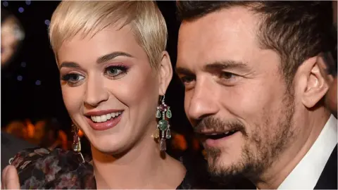 Getty Images Katy Perry and Orlando Bloom at the MusiCares Person of the Year 2019 ceremony on 8 February