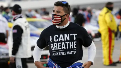 Reuters Bubba Wallace wears a Black Lives Matter shirt at Martinsville Speedway. 10 June 2020