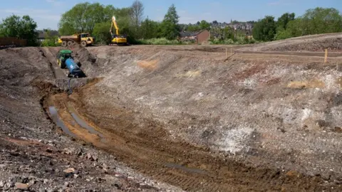 Staffordshire Wildlife Trust Diggers moving earth at the site