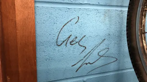 Geraint Thomas's signature on the wall of the Maindy Flyers.