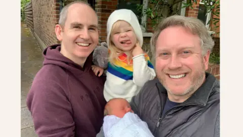 Family photo Tadhg and David with Donncha and Saoirse