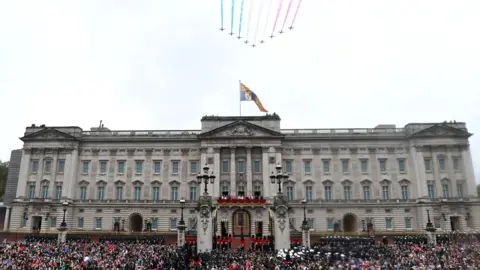 EPA The Red Arrows fly over Buckingham Palace