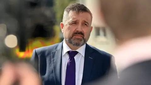 PA Media Robin Swann