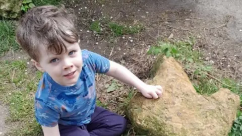 Cody and the dinosaur footprint