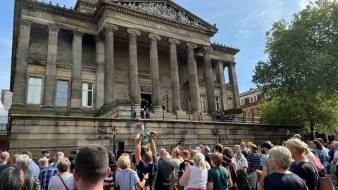 Crowd outside Harris Museum