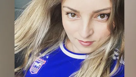 Evie Warne Evie Warne wearing her Ipswich Town football shirt