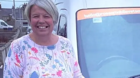 Rosa's Mobile Vets Ynys Mon/Facebook Photo of Linda and the mobile veterinary vehicle