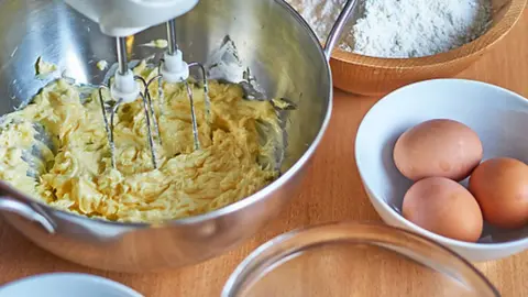 Getty Images Bowls with butter, eggs