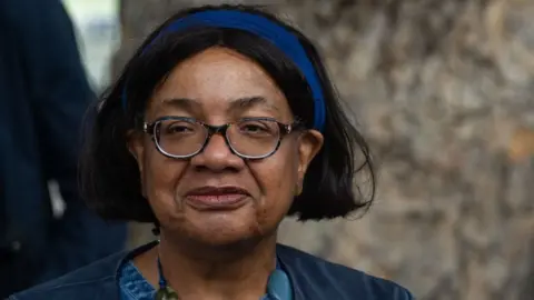 Diane Abbott speaking at a protest by Stand Up to Racism