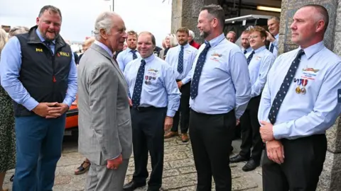 Finnbarr Webster/PA Wire King Charles III meets members of the public during a visit to St Ives Harbour, Cornwall, to meet members of the Cornish community. Picture date: Thursday July 13, 2023