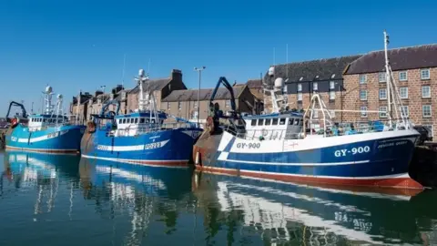 PA Media Fishing trawlers in Aberdeenshire