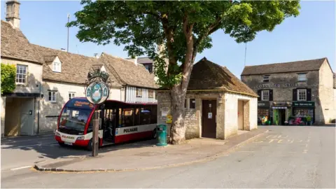 Getty Images Pulhams bus service to Cheltenham in Northleach, Gloucestershire