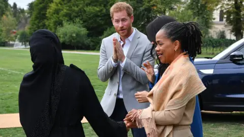 Getty Images Prince Harry, Meghan Markle and Doria Ragland