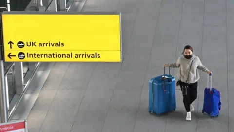 Getty Images Woman at an airport