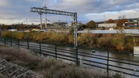 BBC Flooded rail tracks around the New York Stadium in Rotherham