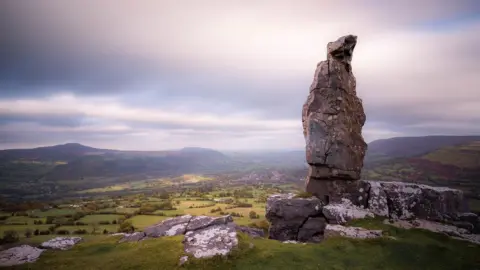 James Whelan 'The Lonely Shepherd' on the top of Llangattock Mountain in the Brecon Beacons by James Whelan