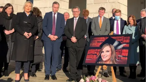 PA Media MLAs at Stormont holding a vigil for murdered teacher Ashling Murphy