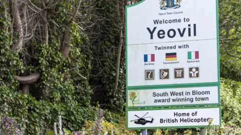 Leonardo Welcome to Yeovil sign with added slogan reading 'Home of British Helicopters'