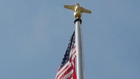 Cambridge American Cemetery New eagle on flagpole