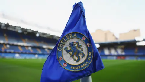 The Chelsea badge on a corner flag at Stamford Bridge