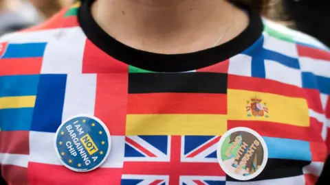 Getty Images A Remain support in a flags jumper