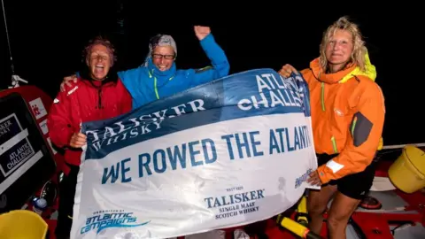 Ted Martin At the race end: From left to right, Sharon Magrath, Di Carrington and Elaine Theaker
