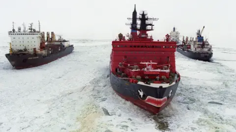 Getty Images Russian cargo ships and icebreaker on the Northern Sea Route (2001 file pic)