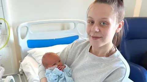 University Hospitals of North Midlands New mum Georgia Hawthorne with her baby Alijah