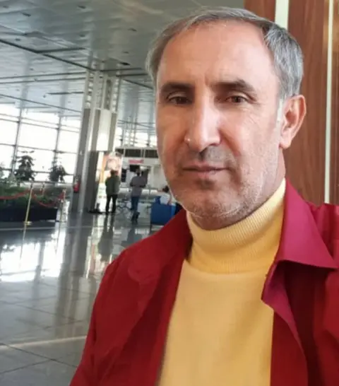 Handout Hamid Nouri at the airport in Iran before he boarded his flight