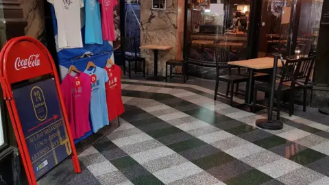 BBC The Scran advertising board inside the arcade