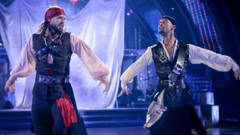 PA Media John Whaite and Johannes Radebe during the final of Strictly Come Dancing 2021