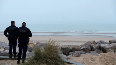 Reuters French police look at the Channel