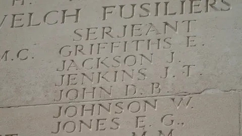 David John D.B. John's name inscribed at a memorial in France