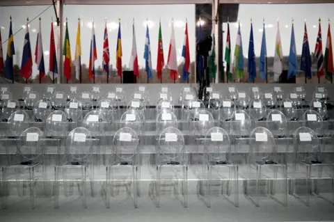 Reuters The empty chairs with the names of guests are seen before a commemoration ceremony for Armistice Day