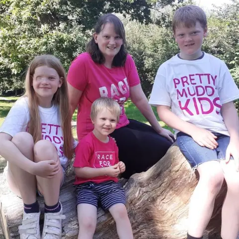 Cancer Research UK Elizabeth with her mum and brothers