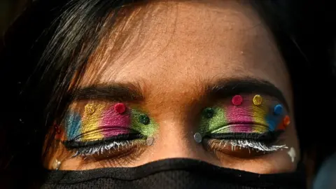 Getty Images In this picture taken on January 8, 2023, a gender rights activist of LGBTQ community takes part in the Delhi queer pride parade in New Delhi. (Photo by Sajjad HUSSAIN / AFP) (Photo by SAJJAD HUSSAIN/AFP via Getty Images)