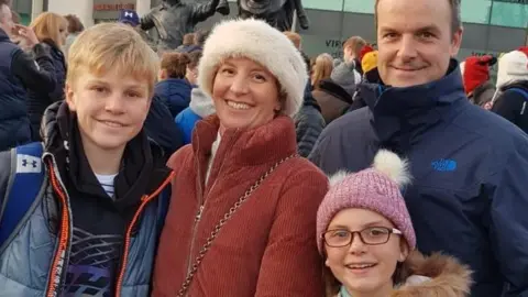 Facebook Anita Nicholson and her son Alex (left) with daughter Annabel and husband Ben (right)