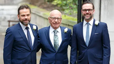 Getty Images Rupert Murdoch with his sons Lachlan Murdoch (L) and James Murdoch (R) arrives at St Bride's Church for a service to celebrate his marriage to Jerry Hall on March 5, 2016