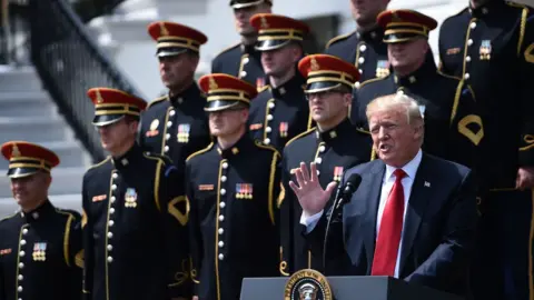Getty Images Donald Trump speaks at a "patriotic event" at the White House.