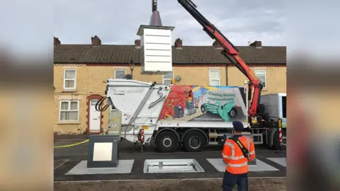 Liverpool City Council Smart bin being installed in Kensington