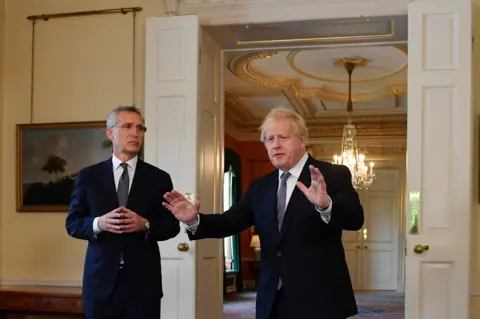 Reuters Boris Johnson and Jens Stoltenberg