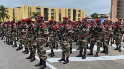 BBC News Soldiers in attendance at Gen Nguema's inauguration