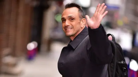 Getty Images Hank Azaria arrives for The Late Show with Stephen Colbert in New York City, 2 April 2019