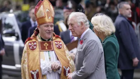 PA Media The Archbishop of York welcomes King Charles to York Minster