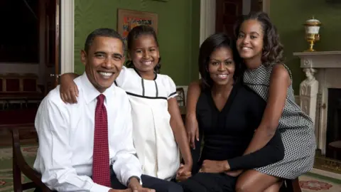 The White House President Barack Obama, First Lady Michelle Obama, and their daughters, Malia and Sasha, sit for a family portrait in the Green Room of the White House, Sept. 1, 2009. Photo by Annie Leibovitz