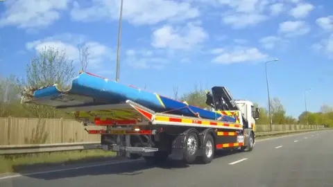 Eddie Mitchell Damaged bus