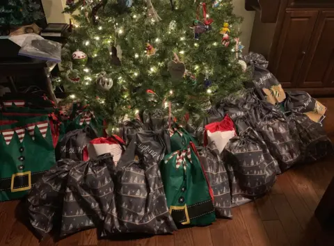 Stacey Woods Stacey Woods, 38, and her family prepared 61 bags for nursing home residents