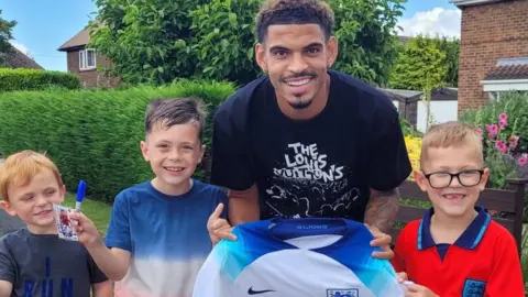 Supplied Noah, Oscar, Morgan Gibbs-White and Oliver pose for a picture together